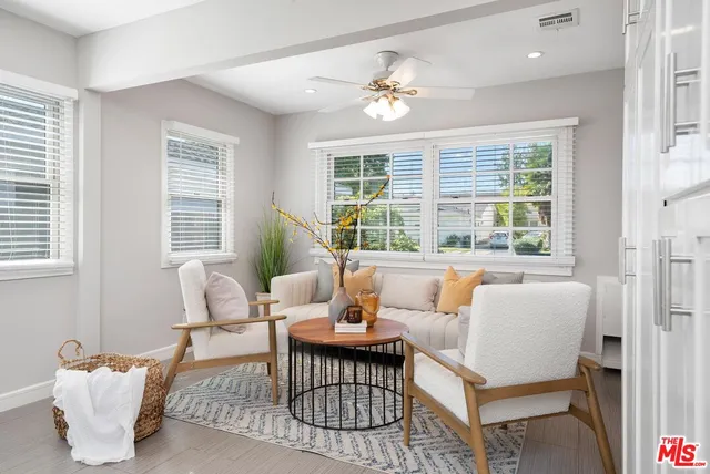 a living room with furniture and window