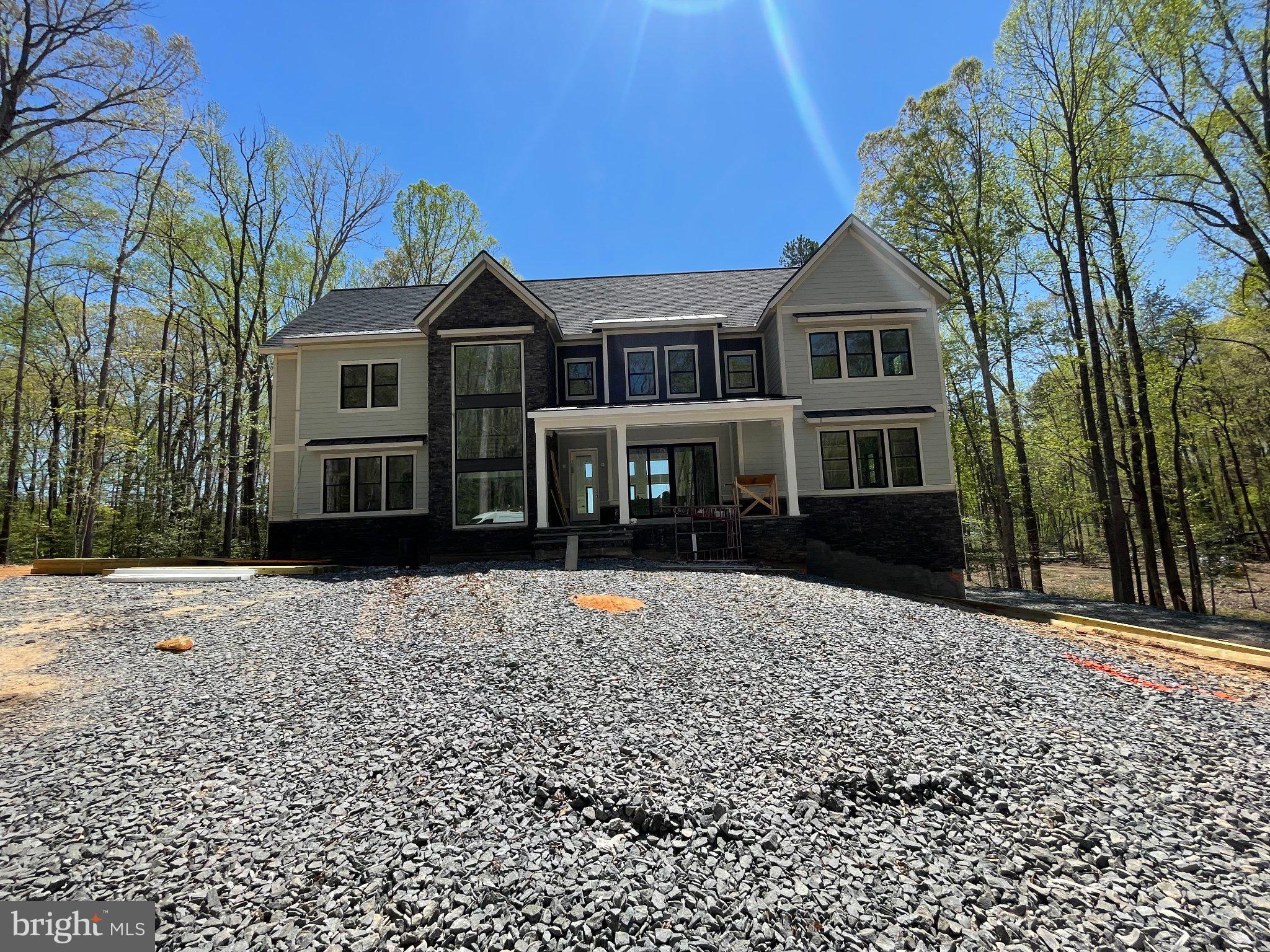 290 Carrs Bridge Road Mineral, VA 23117 - Photo 7 of 38 Modern home nestled in serene woods.