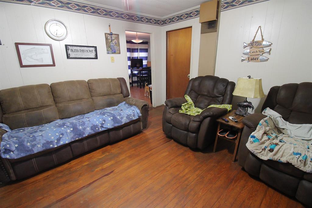 204 Roosevelt Hooks, TX 75561 - Photo 5 of 11 a living room with furniture and a wooden floor