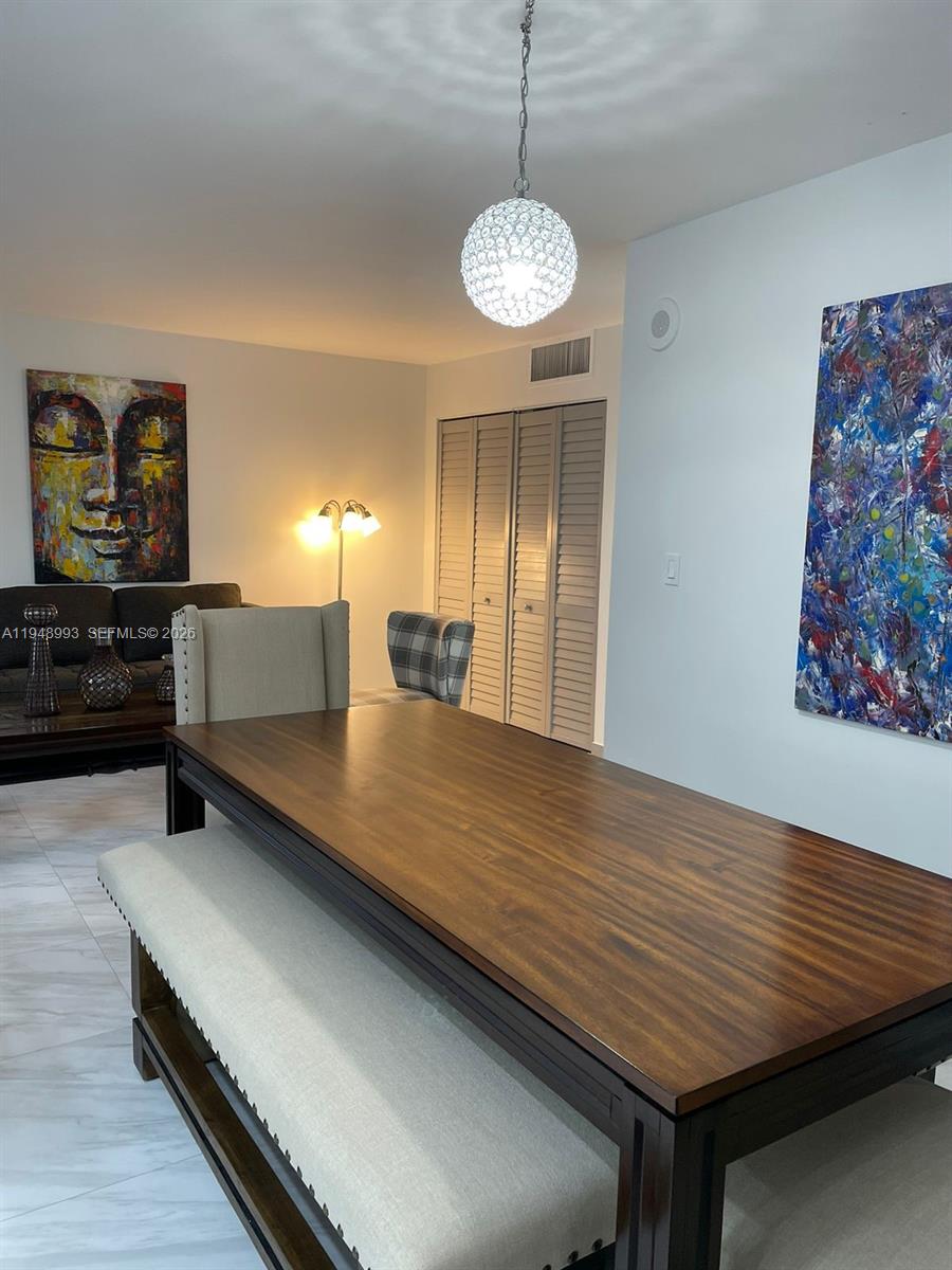 16919 North Bay Road, Unit 104 Sunny Isles Beach, FL 33160 - Photo 23 of 32 a view of kitchen and counter top space