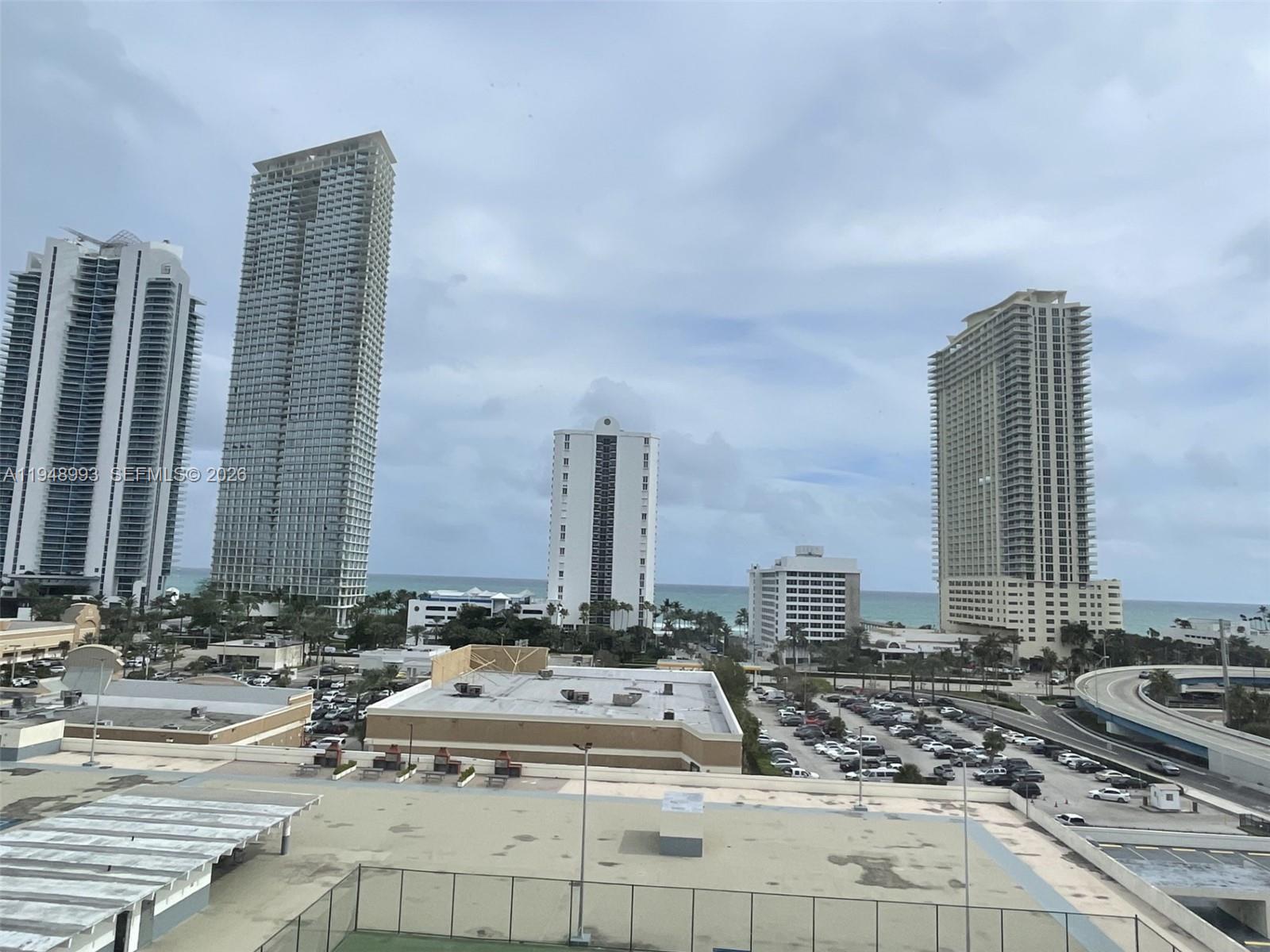 16919 North Bay Road, Unit 104 Sunny Isles Beach, FL 33160 - Photo 26 of 32 a view of a city with tall buildings