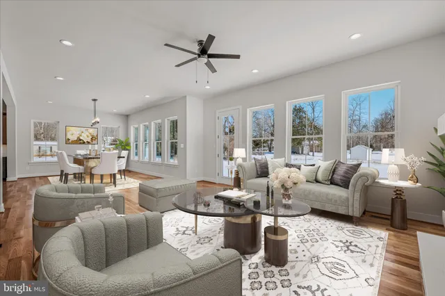 a kitchen with stainless steel appliances a stove a sink and a microwave