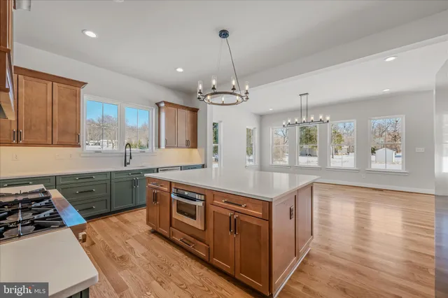 a spacious bathroom with a sink double vanity and a mirror