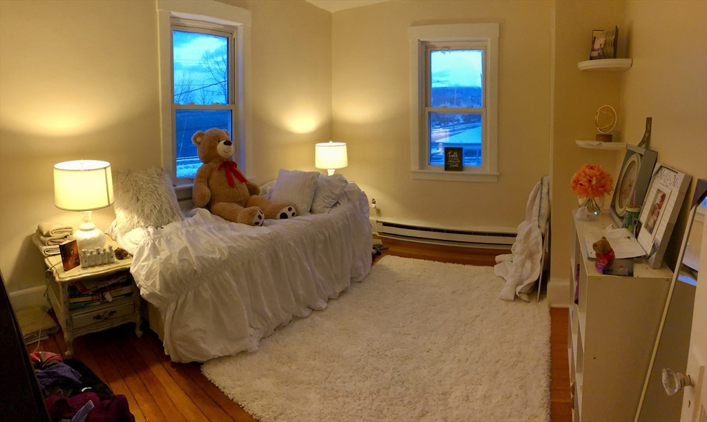 2084 Palmer Road Three Rivers, MA 01080 - Photo 4 of 10 a bedroom with a bed and wooden floor