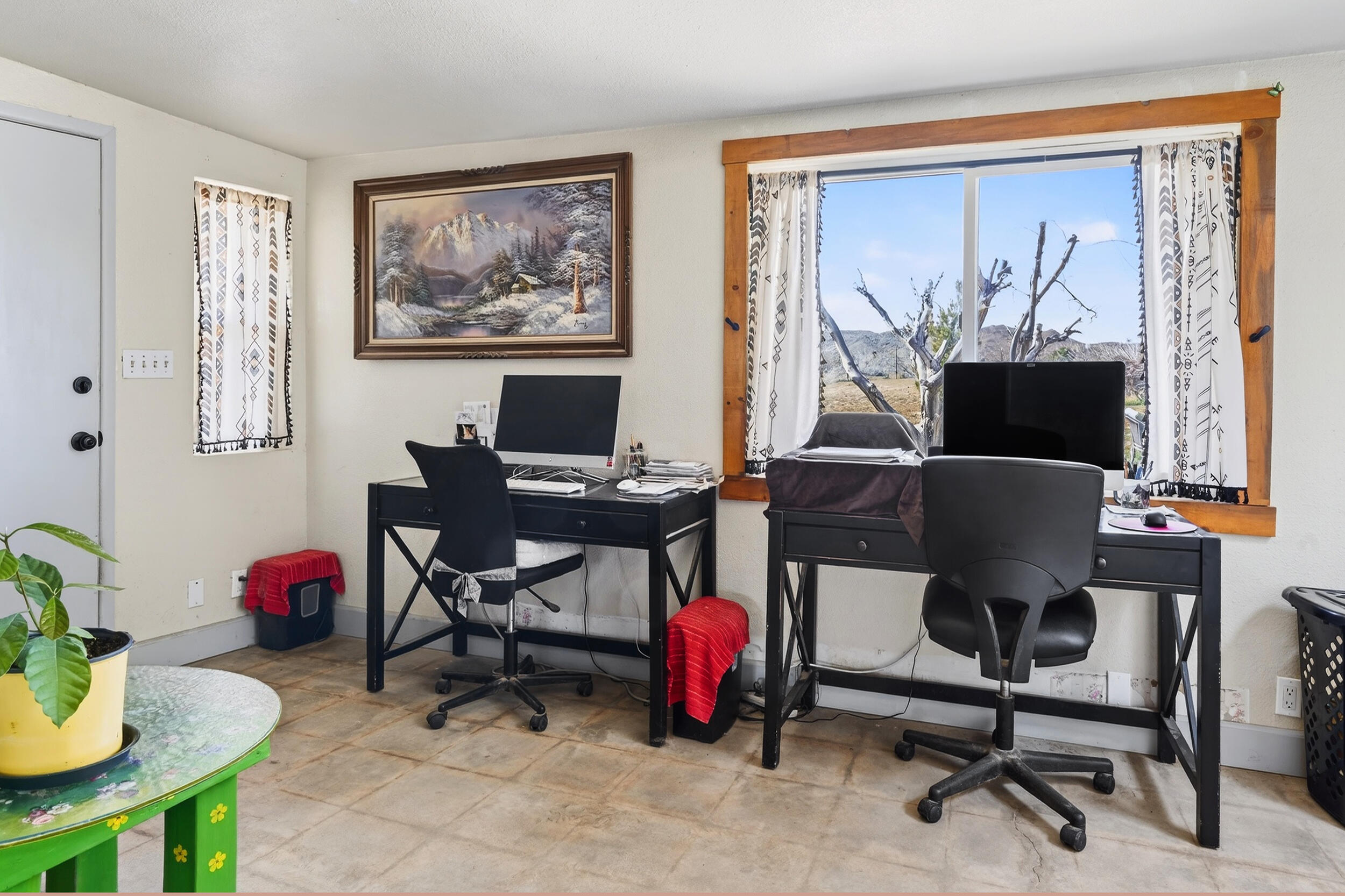 1588 Old Woman Springs Road Yucca Valley, CA 92284 - Photo 26 of 37 a view of a workspace with furniture