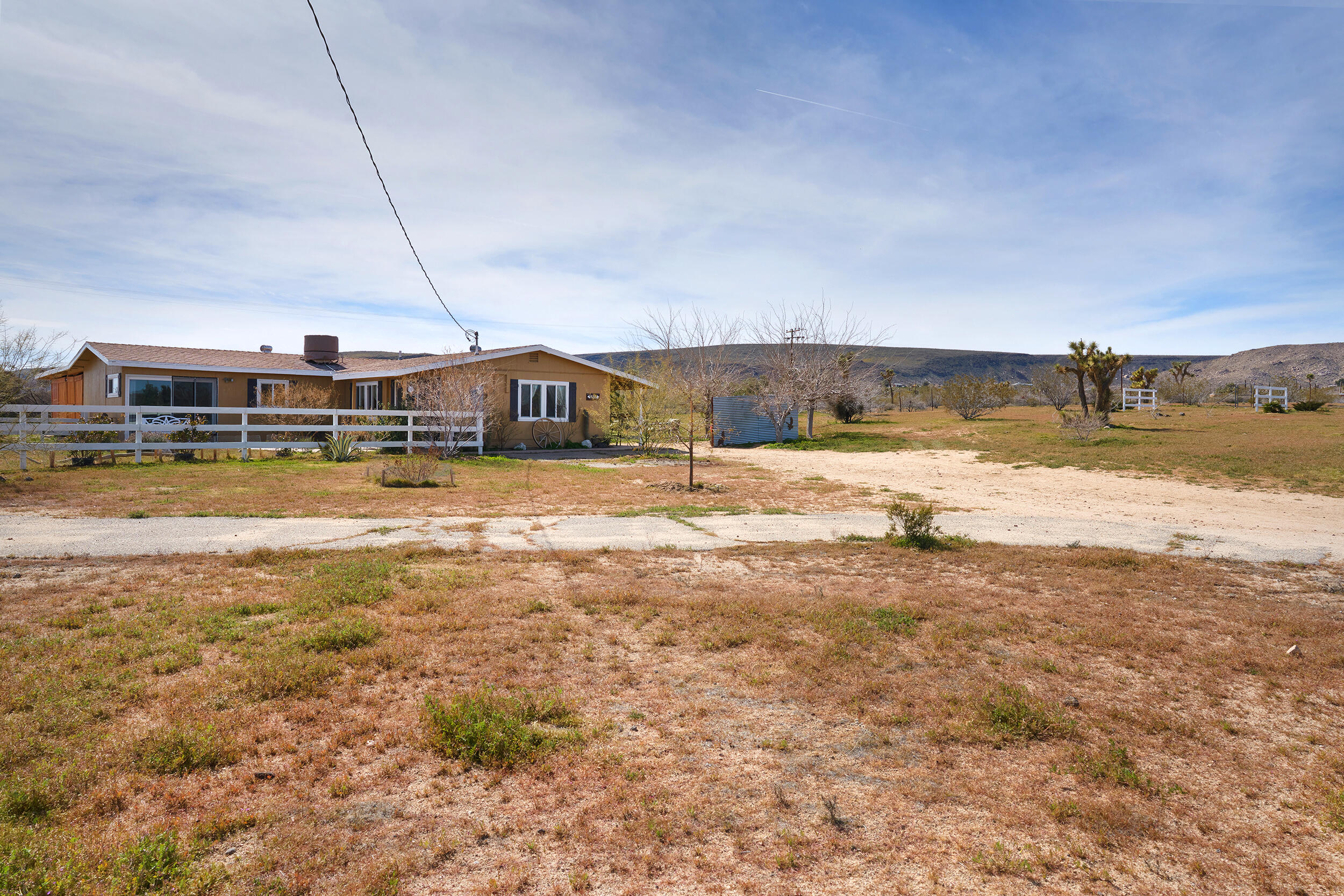 1588 Old Woman Springs Road Yucca Valley, CA 92284 - Photo 31 of 37 a view of a swimming pool with an ocean beach