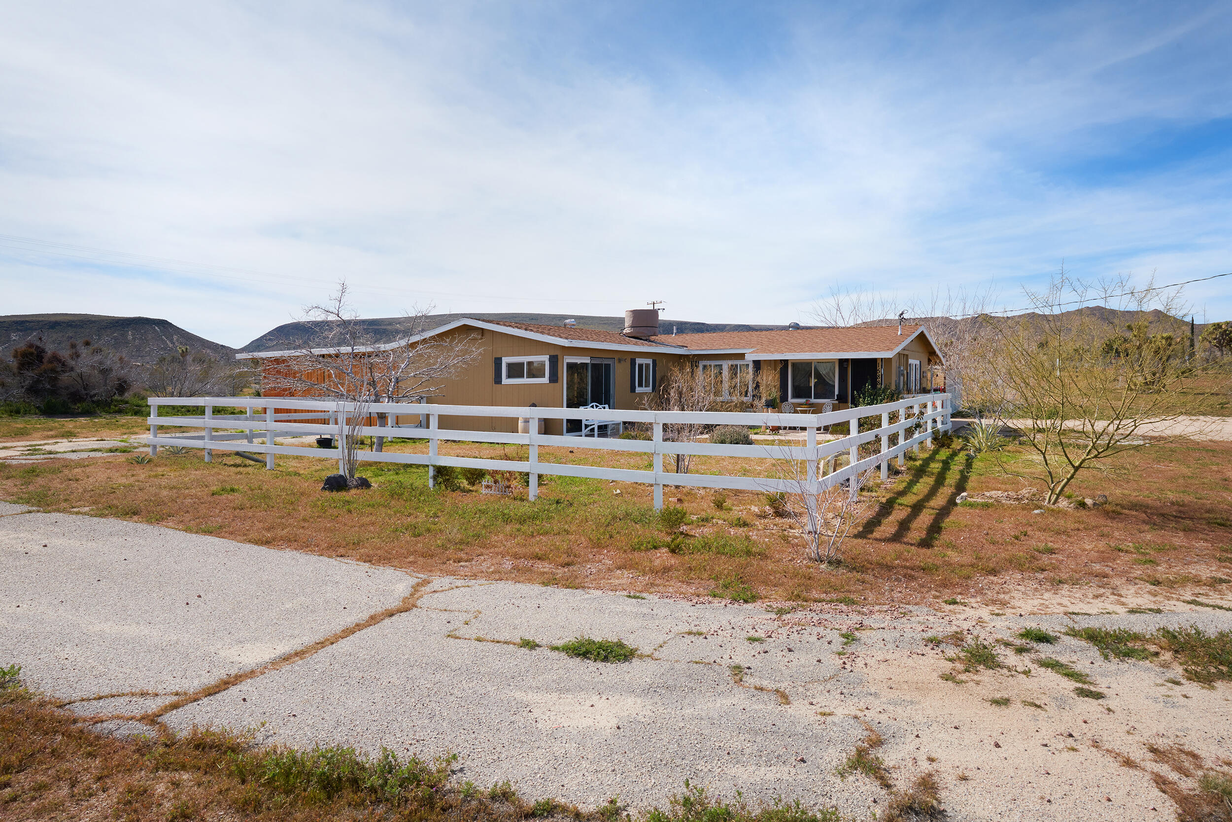 1588 Old Woman Springs Road Yucca Valley, CA 92284 - Photo 33 of 37 a view of residential houses with lake and mountain view