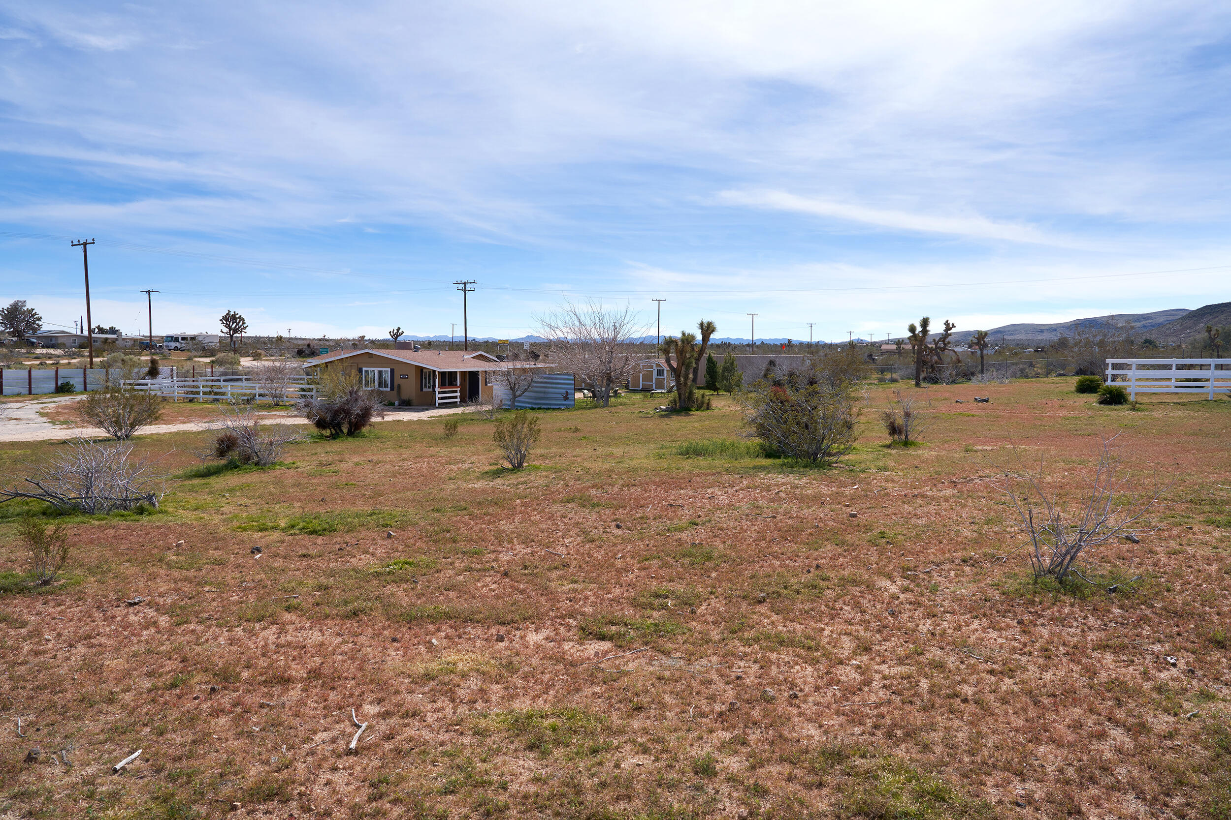 1588 Old Woman Springs Road Yucca Valley, CA 92284 - Photo 34 of 37 a view of a town with big trees