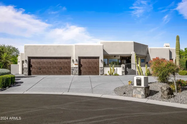 a view of a house with a terrace