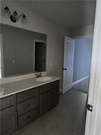 a view of a hallway with washer and dryer