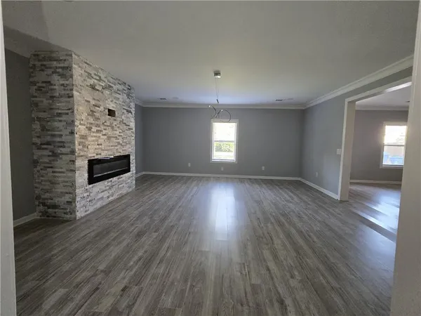 a view of a living room and hardwood floor
