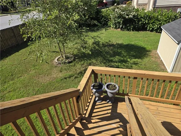 a bathroom with a bathtub and a double vanity sink