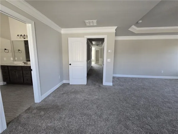 a bathroom with a double vanity sink and mirror