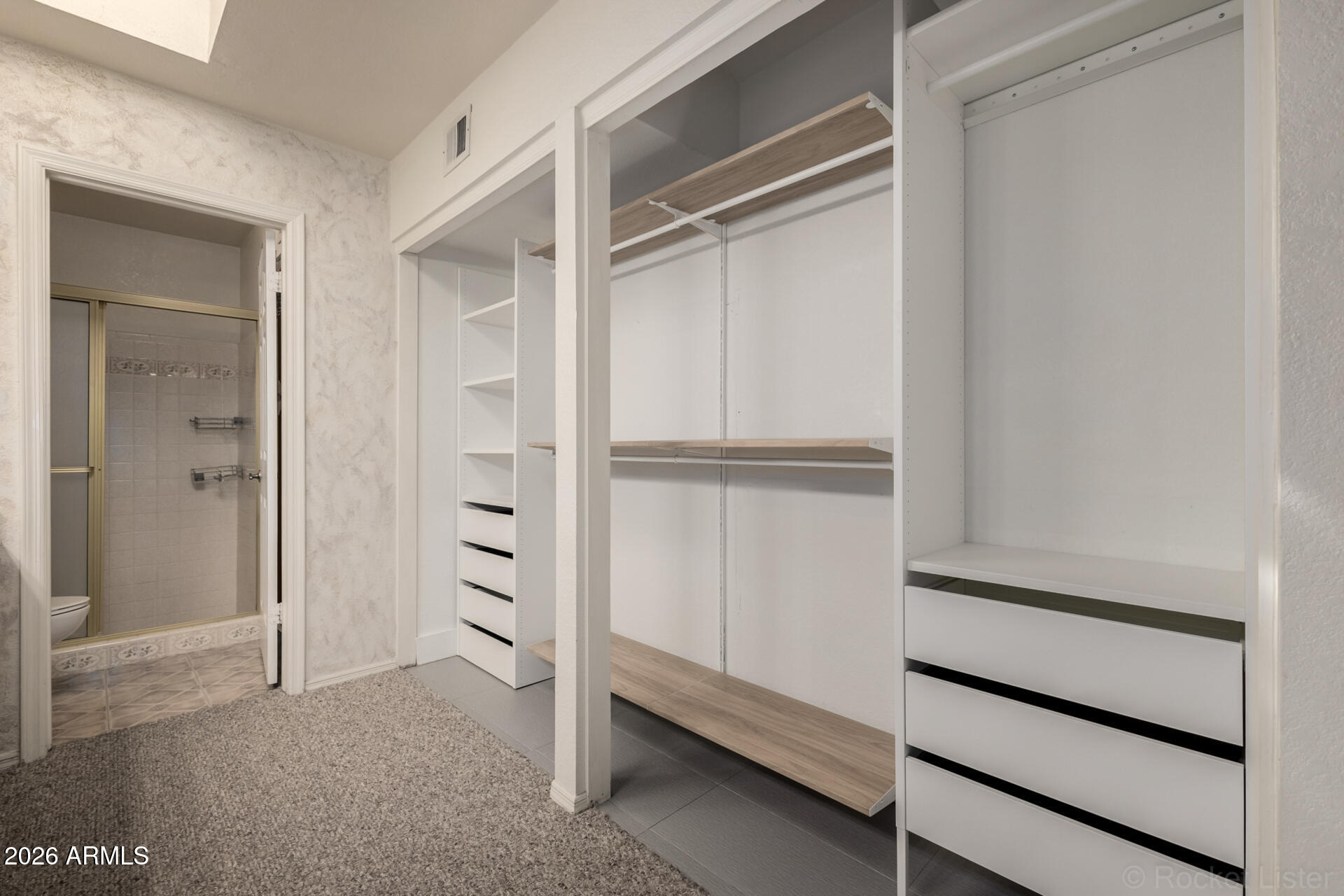 3004 West Phelps Road Phoenix, AZ 85053 - Photo 20 of 34 Master Walk-In Closet
