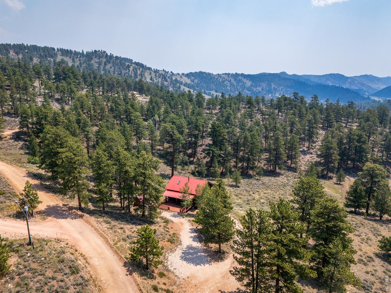 296 Caddo Road Red Feather Lakes, CO 80545 - Photo 35 of 50 Aerial shot showing upper driveway.