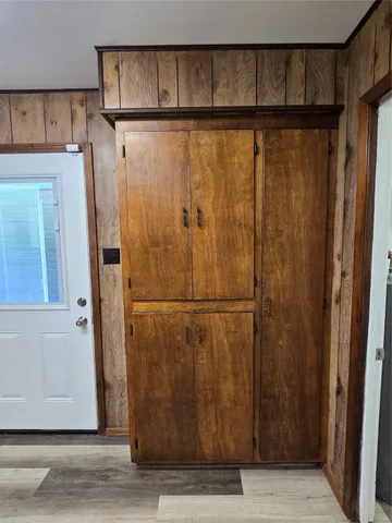 a kitchen with a stove a sink and a microwave