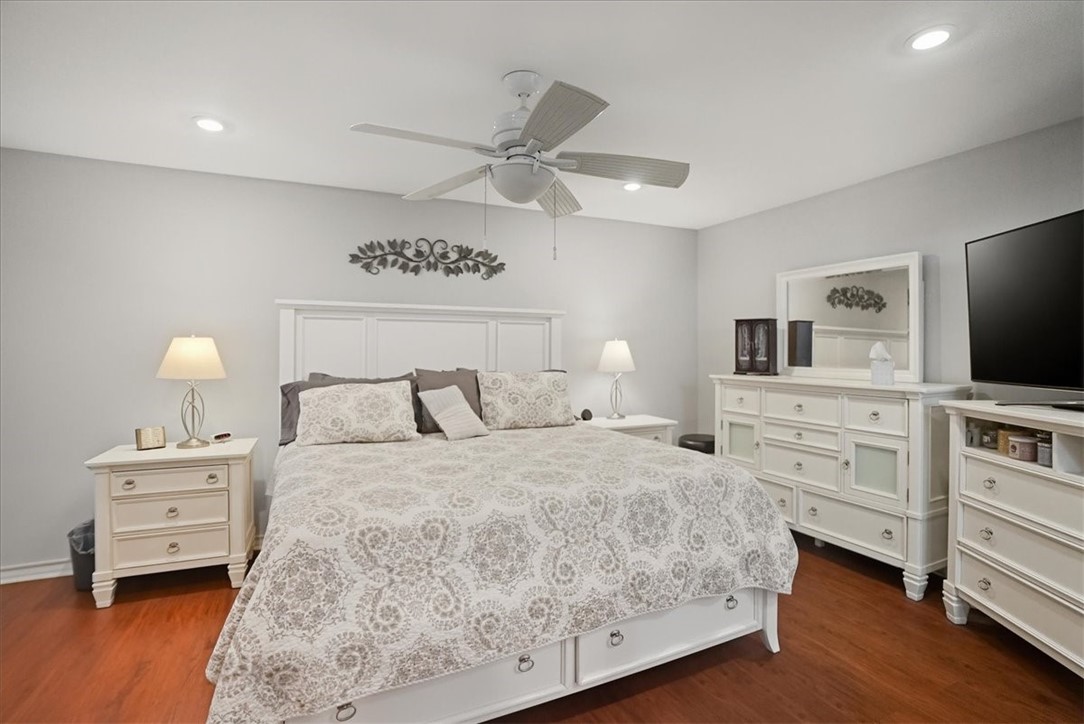 4218 Beard Drive Corpus Christi, TX 78413 - Photo 17 of 31 a bedroom with a bed and a flat tv screen on dresser