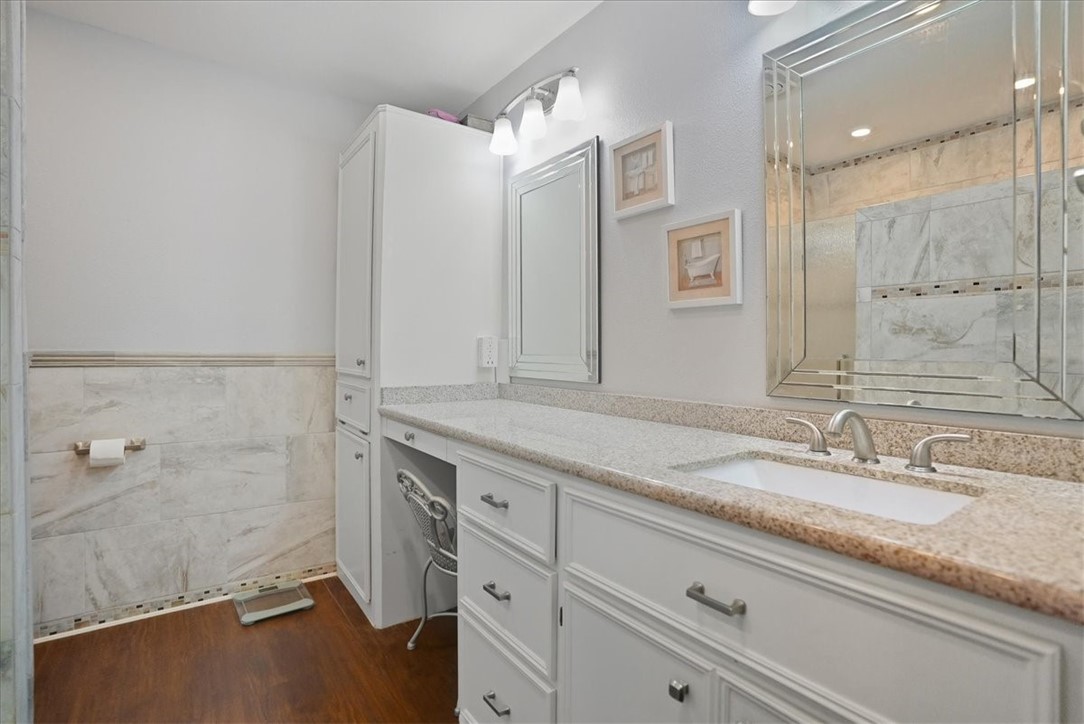 4218 Beard Drive Corpus Christi, TX 78413 - Photo 21 of 31 a bathroom with a granite countertop sink mirror and double