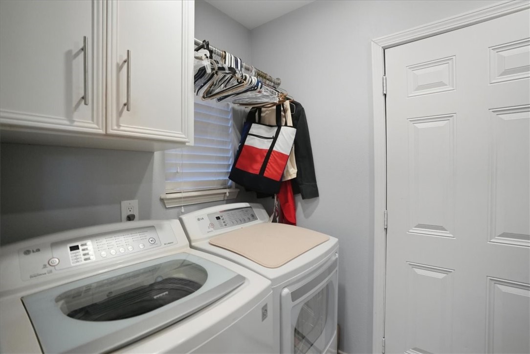 4218 Beard Drive Corpus Christi, TX 78413 - Photo 29 of 31 a utility room with dryer and washer