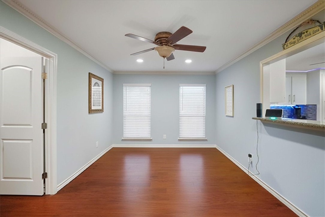 4218 Beard Drive Corpus Christi, TX 78413 - Photo 8 of 31 a view of an empty room with window and wooden floor
