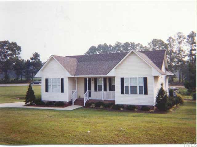 2050 Guy Road Angier, NC 27501 - Photo 1 of 1 a view of a house with a swimming pool