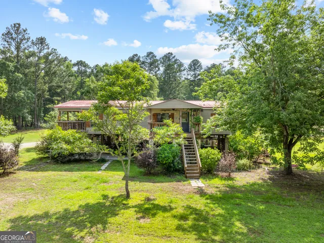 a view of a garden with a bench