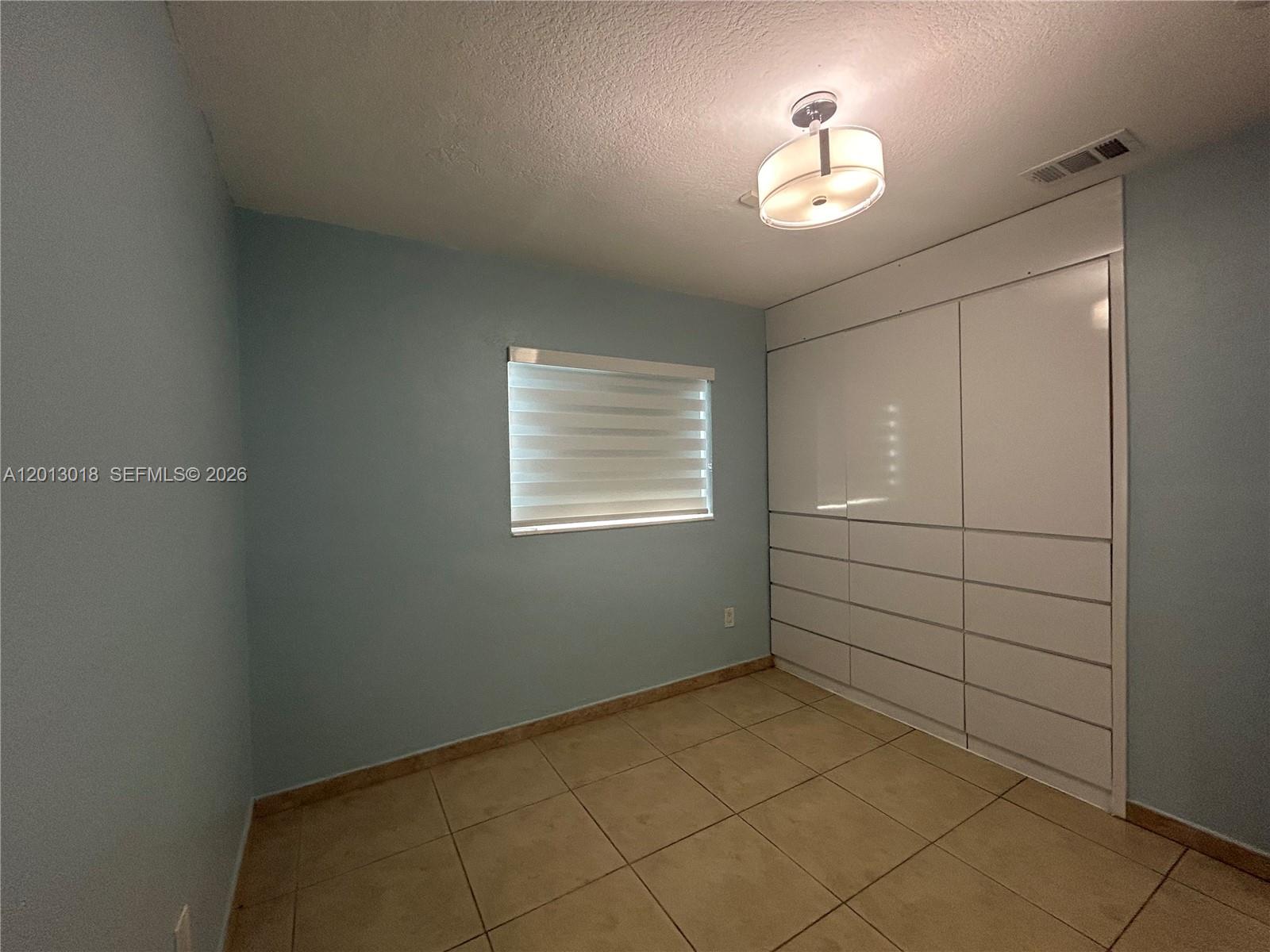 6202 Southwest 107th Avenue Miami, FL 33173 - Photo 11 of 22 a view of room and window