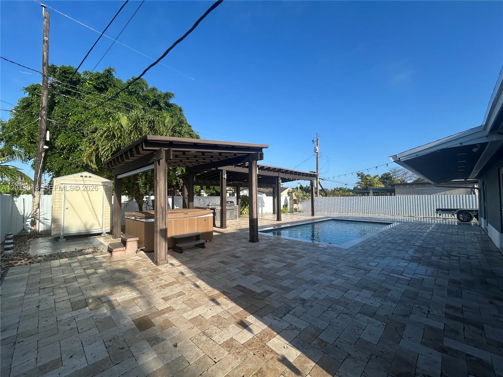 6202 Southwest 107th Avenue Miami, FL 33173 - Photo 21 of 22 a view of a house with basketball court