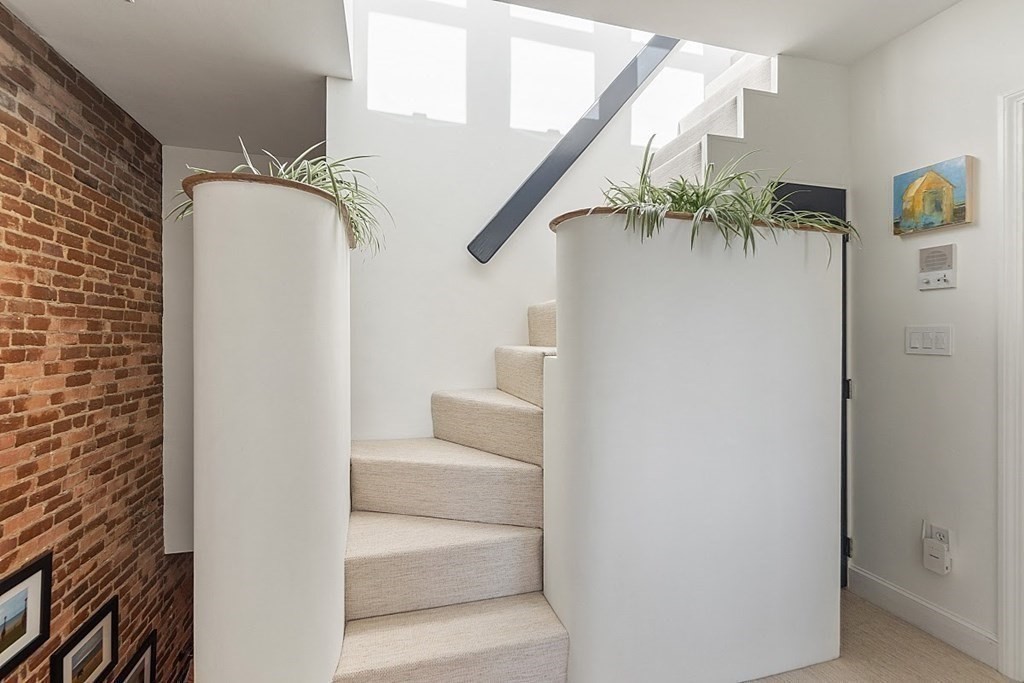 40 Rutland Square, Unit 5 Boston, MA 02118 - Photo 12 of 19 a view of entryway and hall with wooden floor