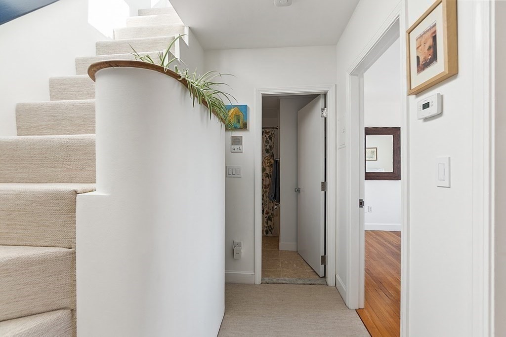 40 Rutland Square, Unit 5 Boston, MA 02118 - Photo 13 of 19 a view of staircase and hallway