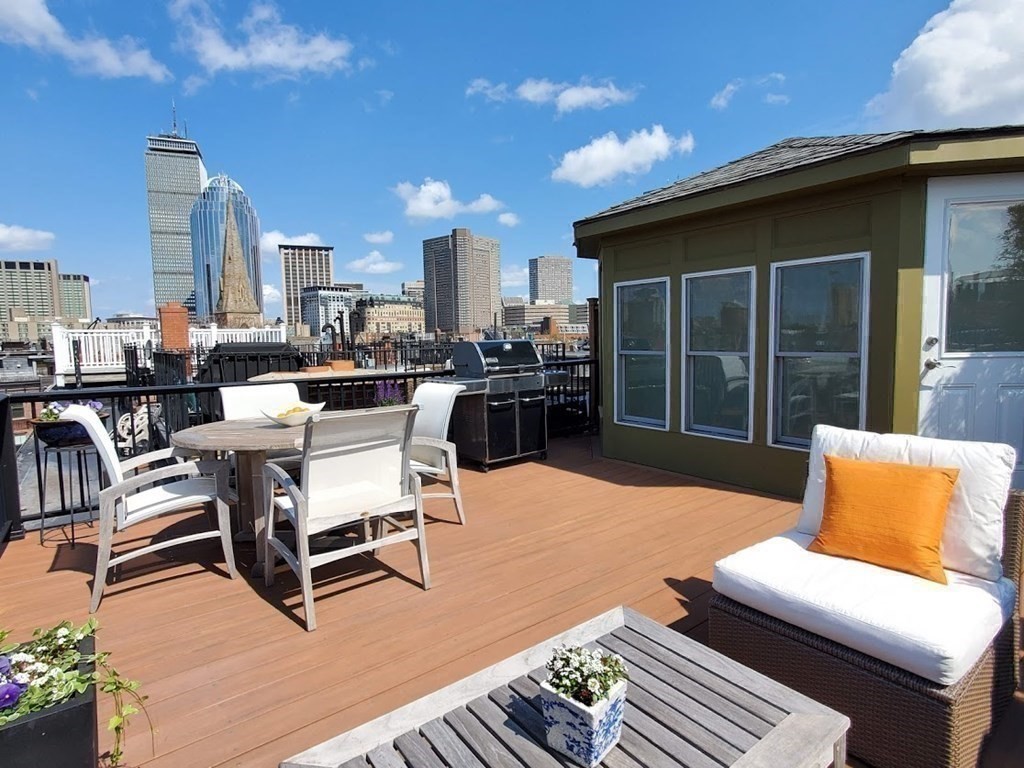 40 Rutland Square, Unit 5 Boston, MA 02118 - Photo 15 of 19 a outdoor living space with furniture and a potted plant