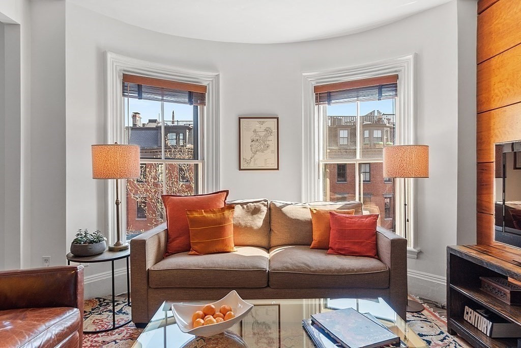 40 Rutland Square, Unit 5 Boston, MA 02118 - Photo 3 of 19 a living room with furniture a rug and a window