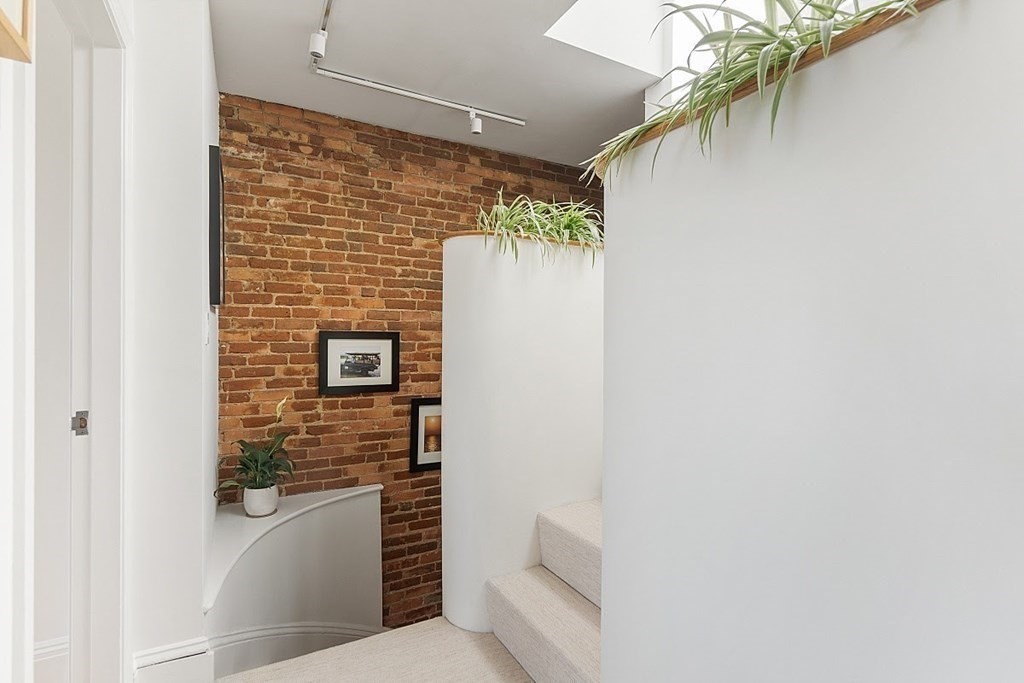 40 Rutland Square, Unit 5 Boston, MA 02118 - Photo 8 of 19 a bathroom with a toilet and shower