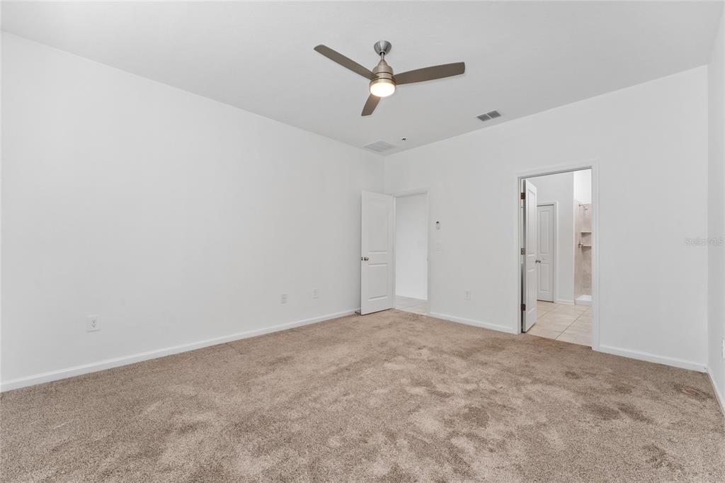 566 Hatteras Road Davenport, FL 33837 - Photo 12 of 28 an empty room