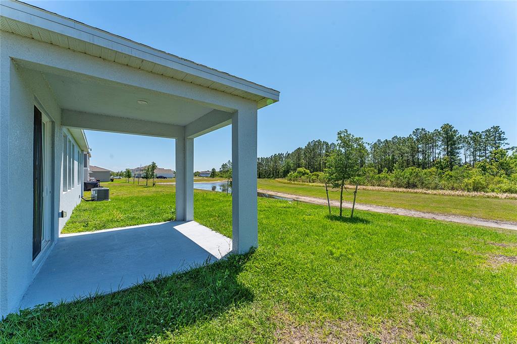 566 Hatteras Road Davenport, FL 33837 - Photo 24 of 28 a view of a park with a slide