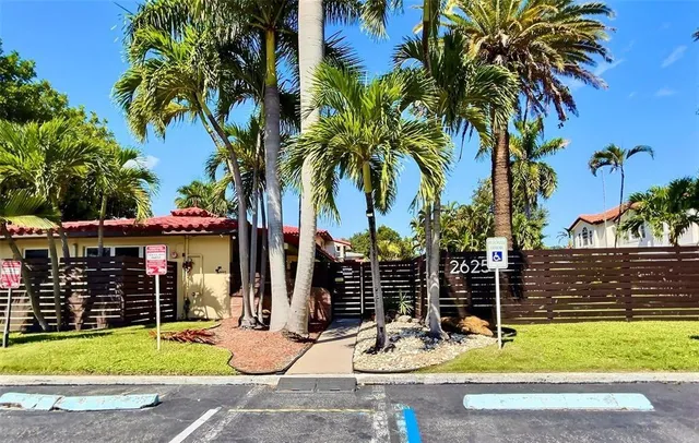 front view of a house with a patio