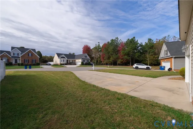 a view of a swimming pool with an outdoor seating