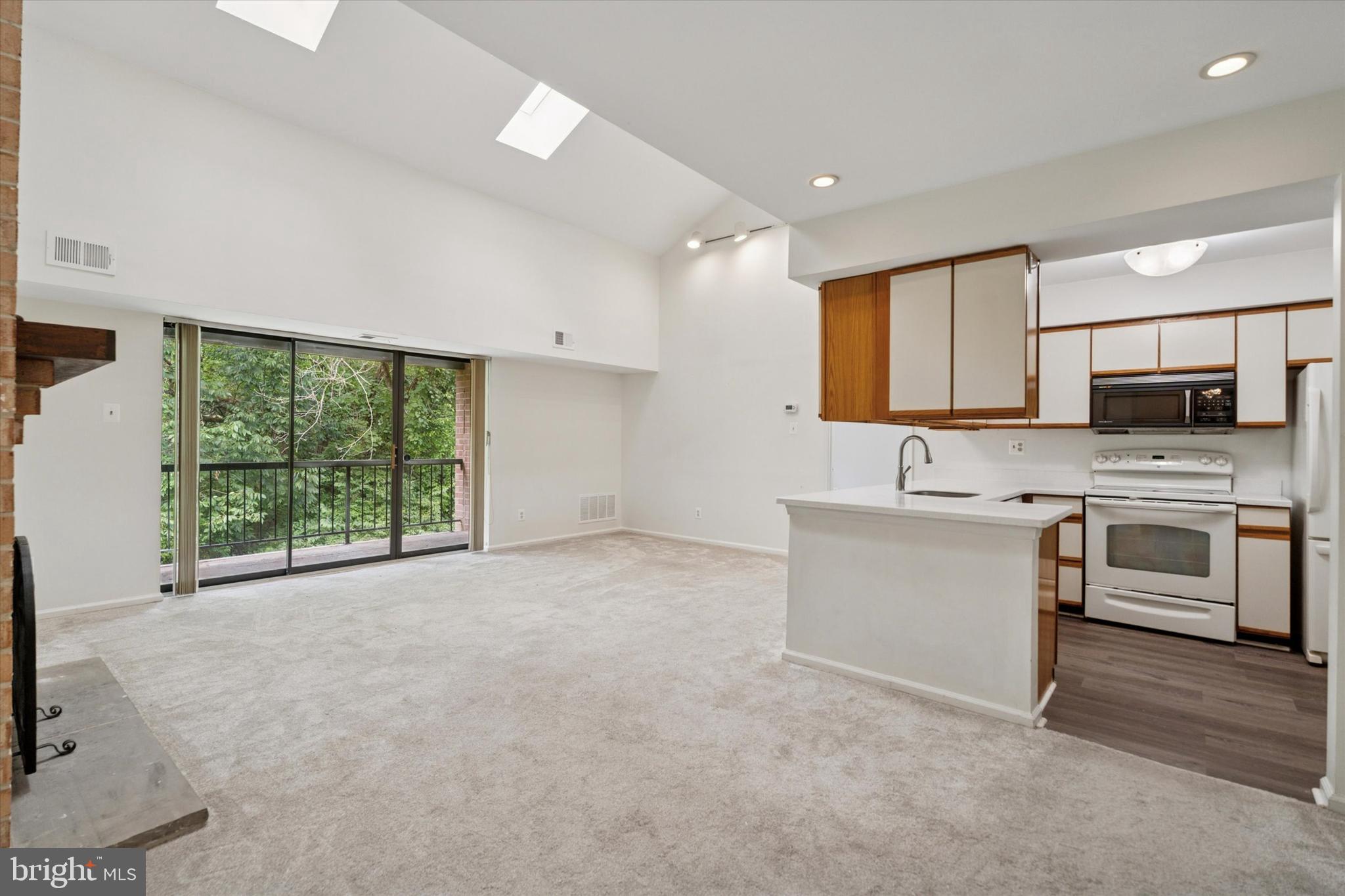 722 Washington Place, Unit 22 Chesterbrook, PA 19087 - Photo 4 of 19 Open Concept Living with Skylights