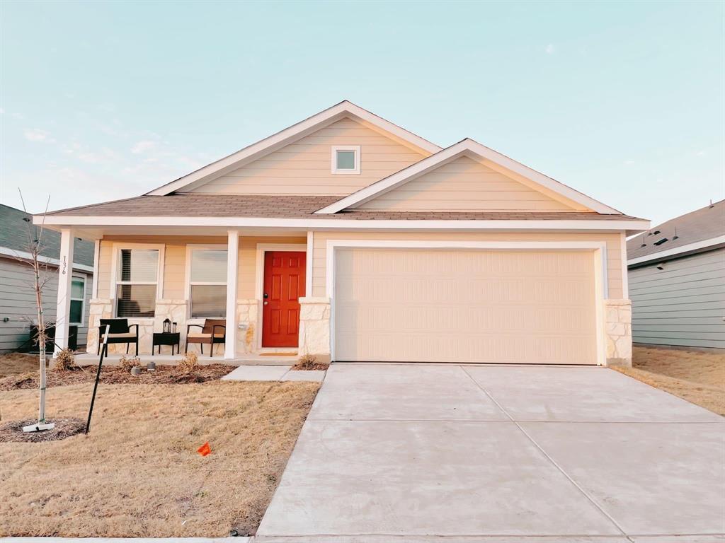 a front view of a house with patio