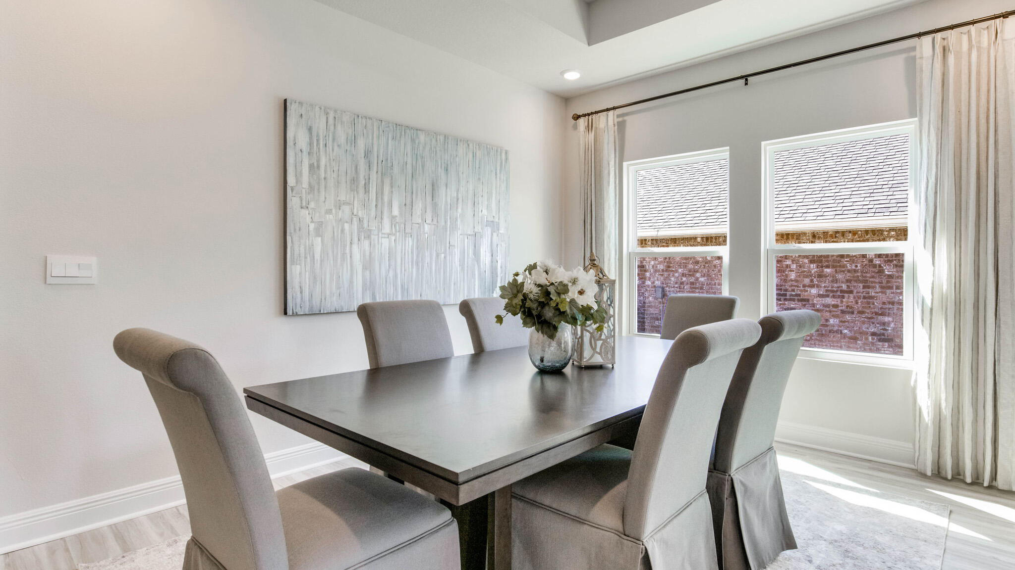 8688 Bluebell Street Milton, FL 32583 - Photo 15 of 32 a view of a dining room with furniture and window