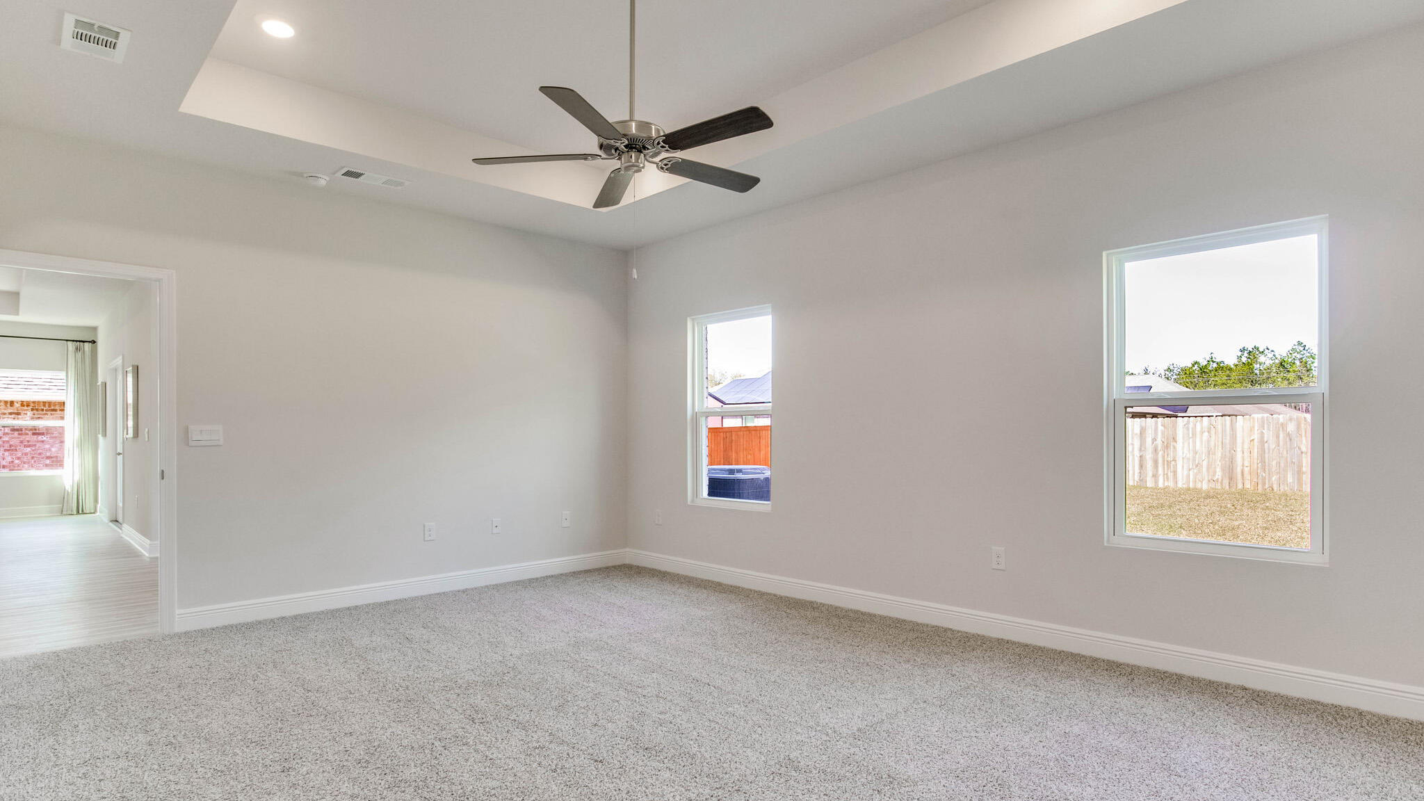 8688 Bluebell Street Milton, FL 32583 - Photo 19 of 32 a view of an empty room with a window