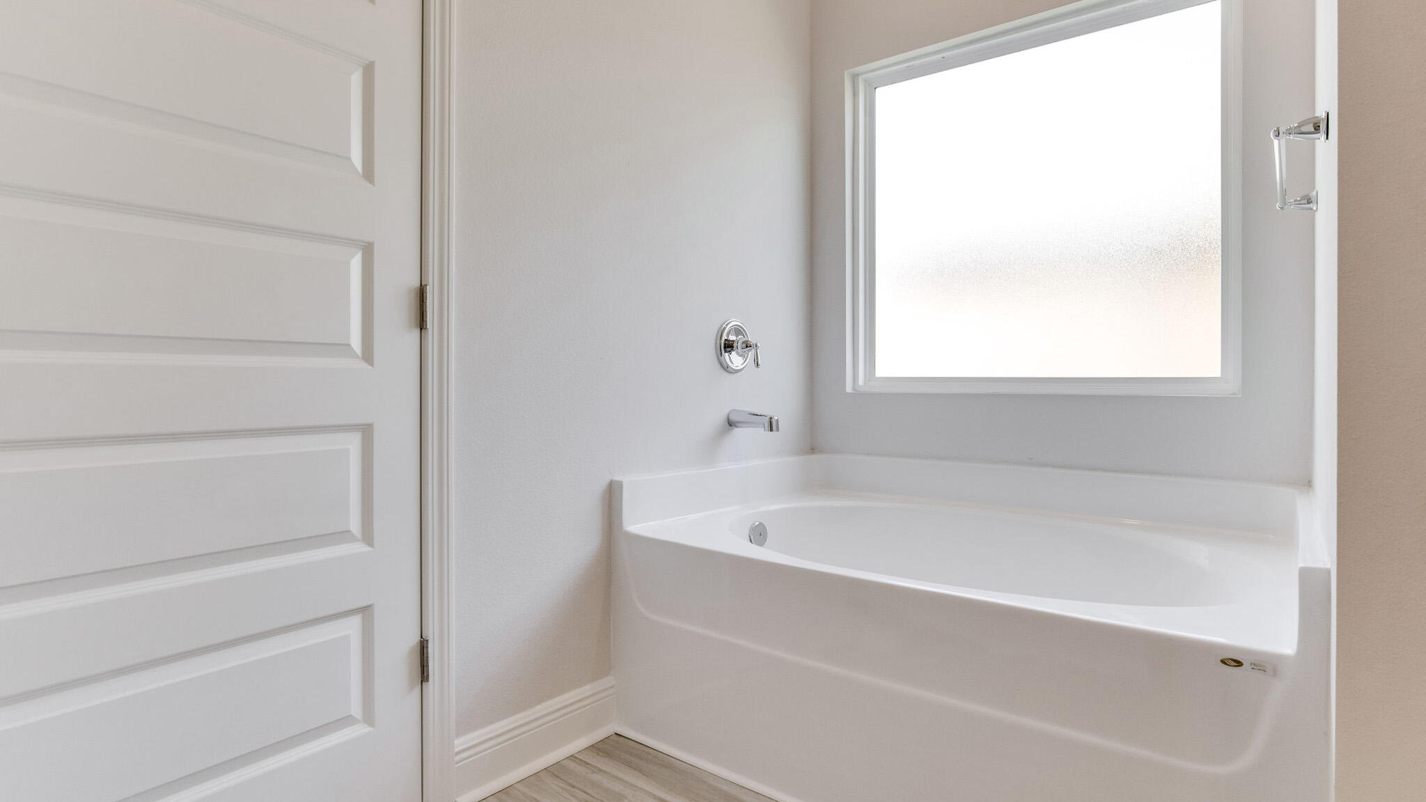 8688 Bluebell Street Milton, FL 32583 - Photo 22 of 32 a white bath tub sitting next to a window
