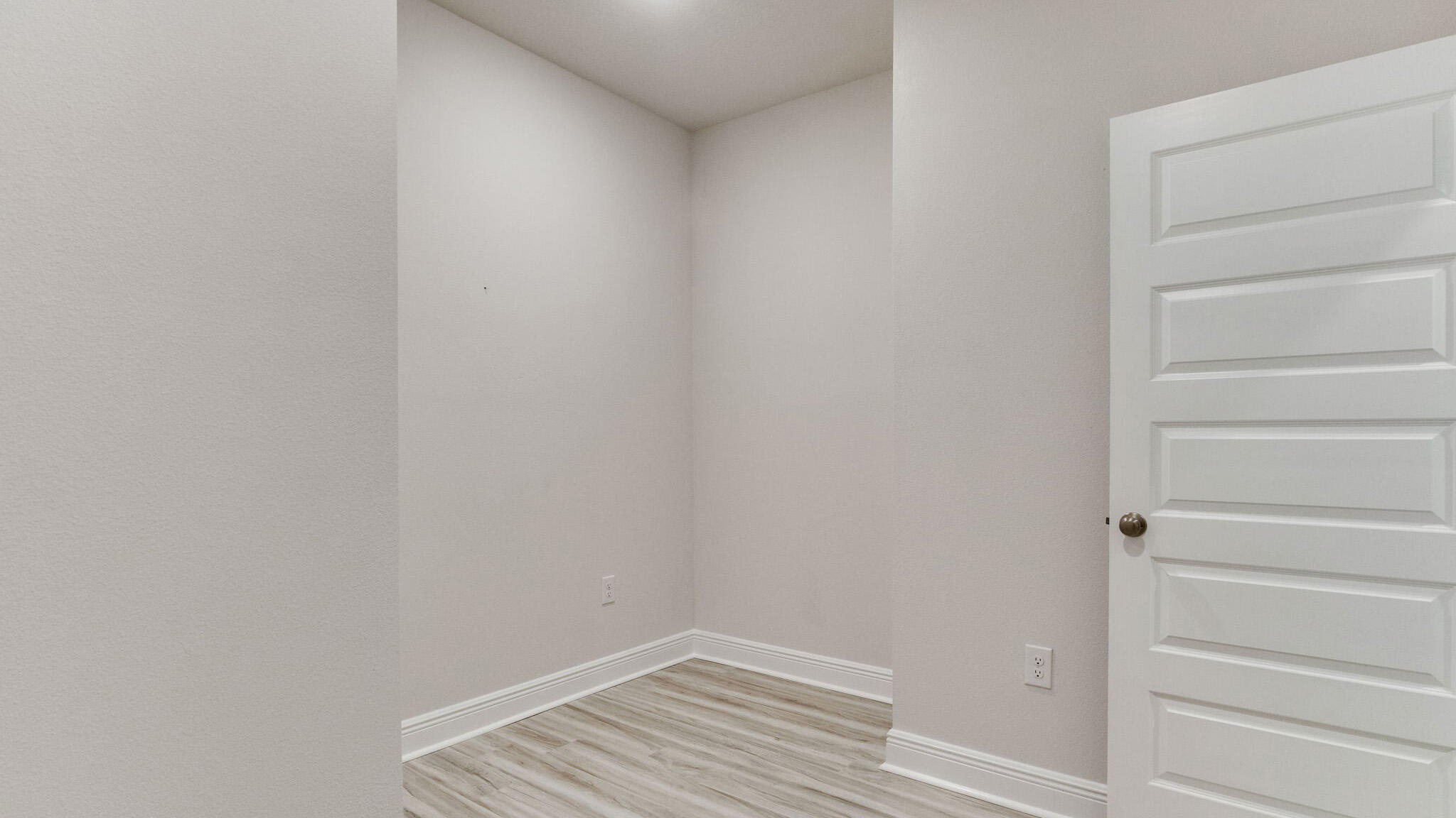 8688 Bluebell Street Milton, FL 32583 - Photo 25 of 32 a view of small space with racks on the wall