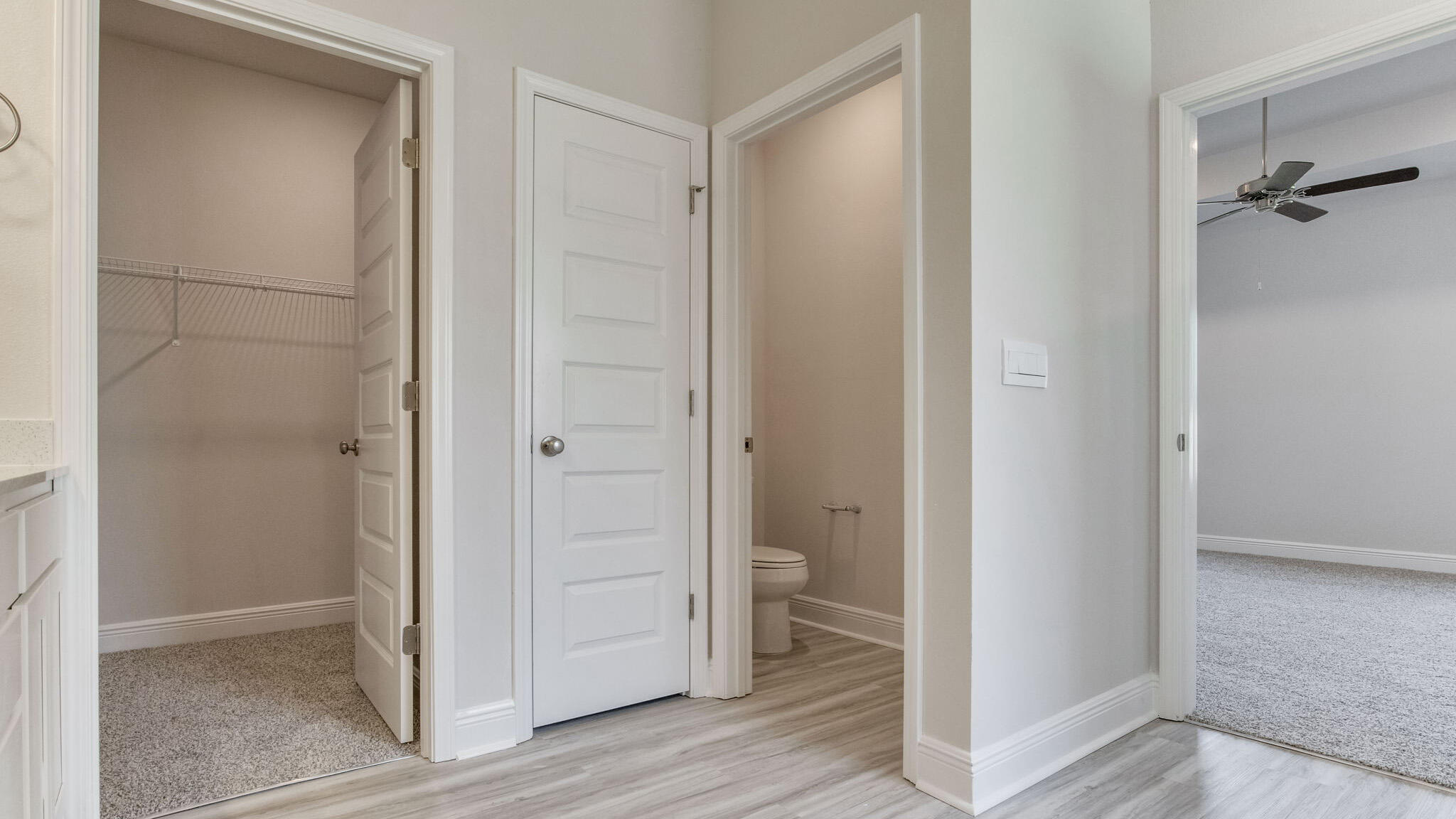 8688 Bluebell Street Milton, FL 32583 - Photo 27 of 32 wooden floor in an empty room