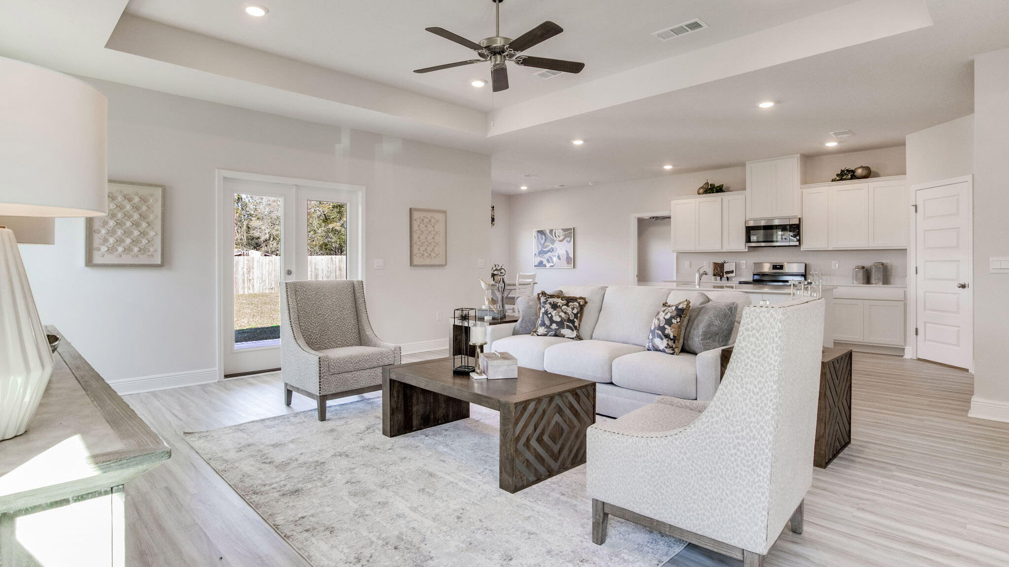 8688 Bluebell Street Milton, FL 32583 - Photo 3 of 32 a living room with furniture and kitchen view
