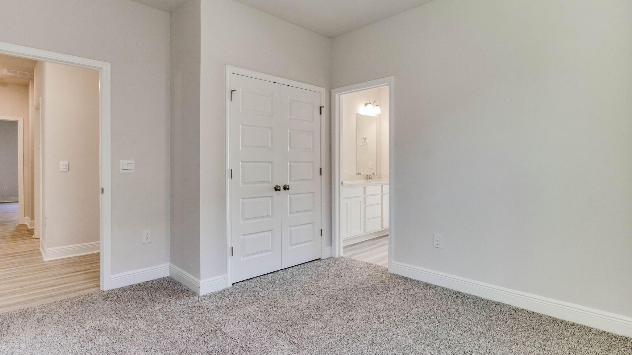 8688 Bluebell Street Milton, FL 32583 - Photo 31 of 32 an empty room with closet area