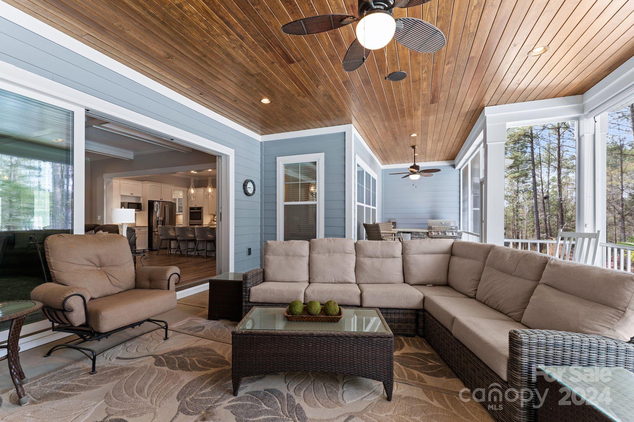 6084 Chimney Bluff Road Lancaster, SC 29720 - Photo 20 of 39 a living room with furniture and a large window