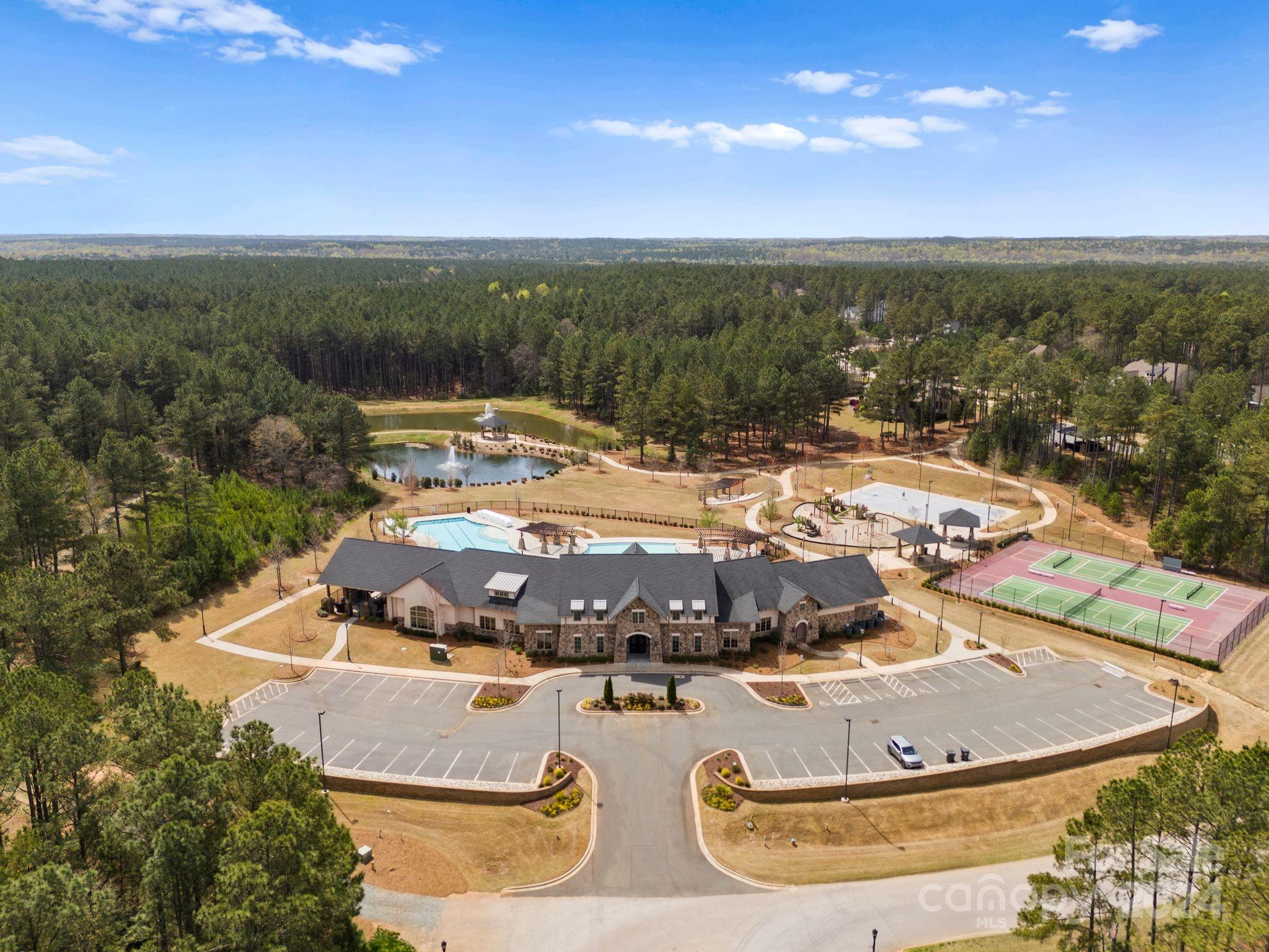 6084 Chimney Bluff Road Lancaster, SC 29720 - Photo 36 of 39 a view of a swimming pool with a yard