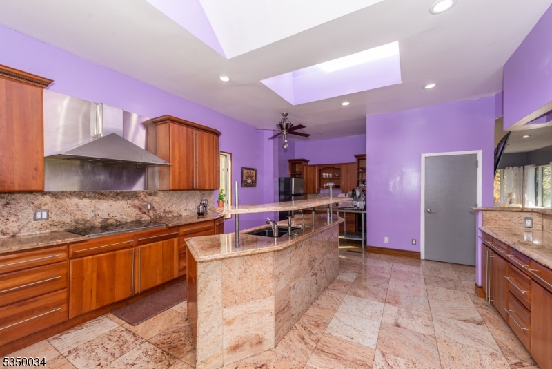 155 Route560 Layton, NJ 07851 - Photo 17 of 42 a kitchen with stainless steel appliances kitchen island granite countertop a sink and cabinets