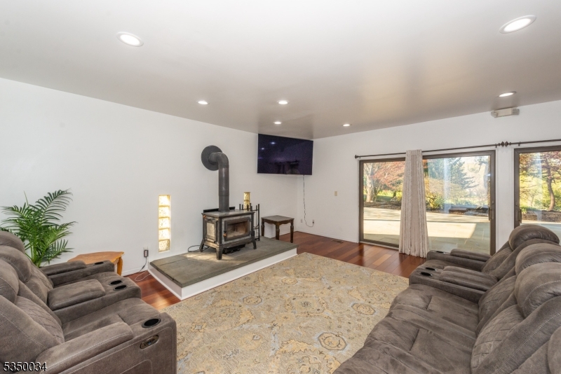 155 Route560 Layton, NJ 07851 - Photo 23 of 42 a living room with furniture and a flat screen tv